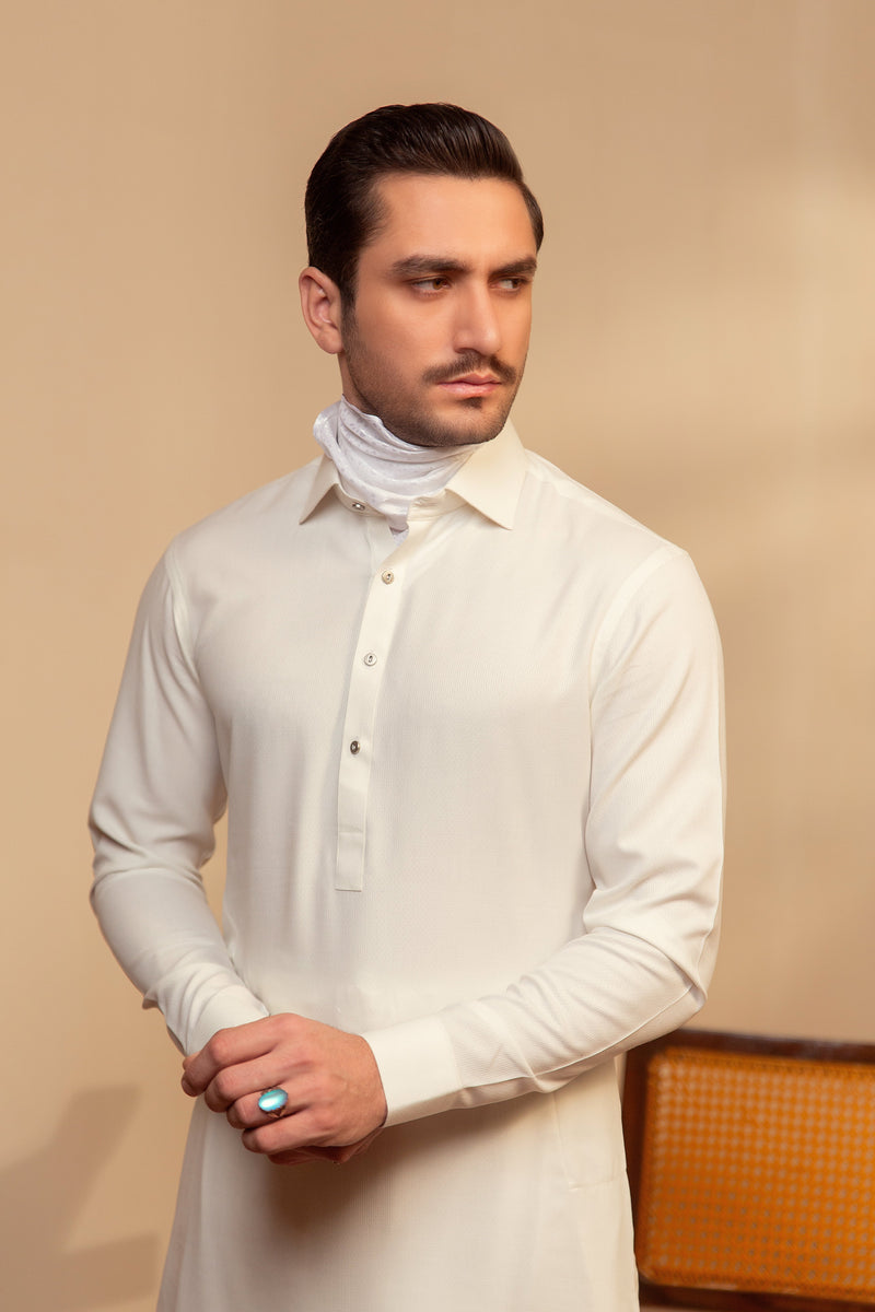 Basic white shalwar kameez.